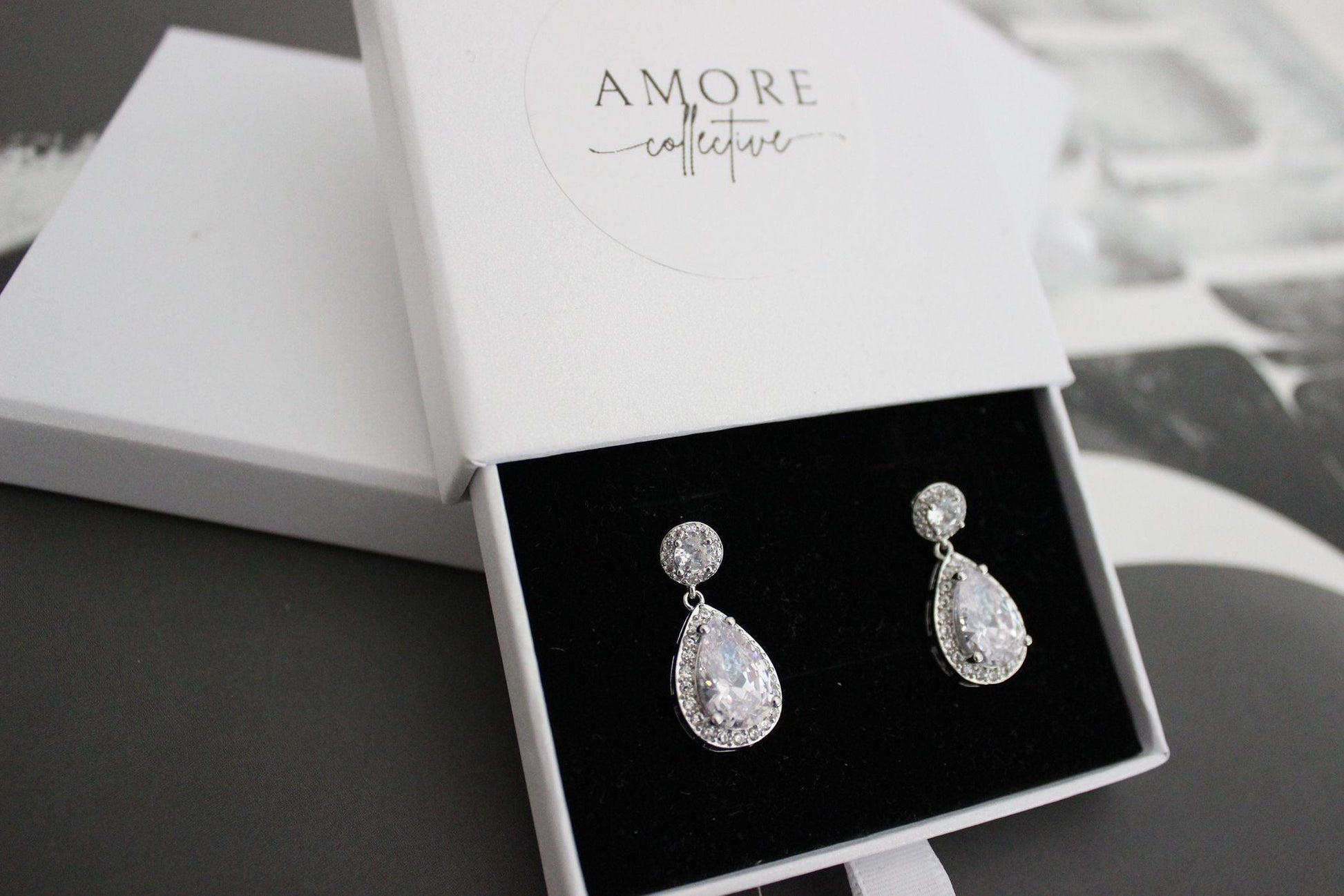 Round and Pear Drop Cubic Zirconia Silver Earrings