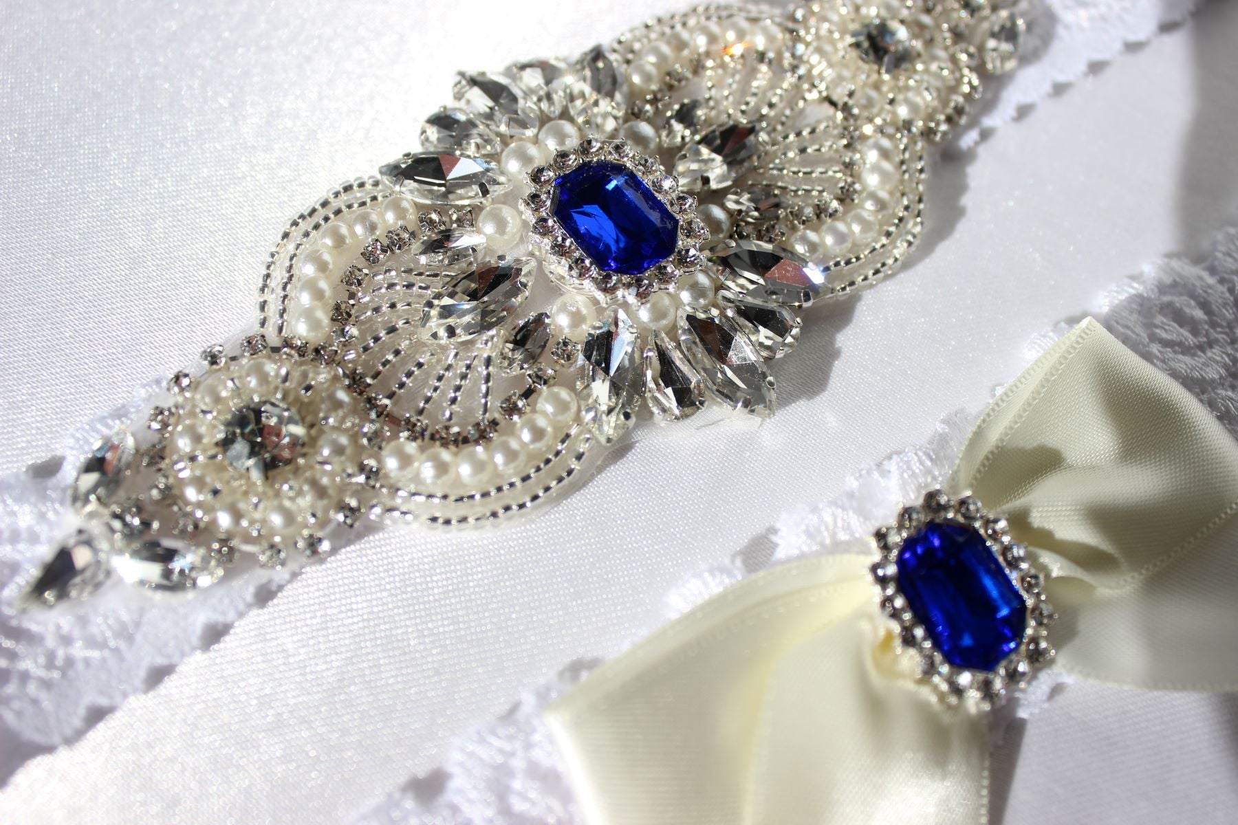 Sapphire bridal garter set with one embellished garter and one ribbon garter