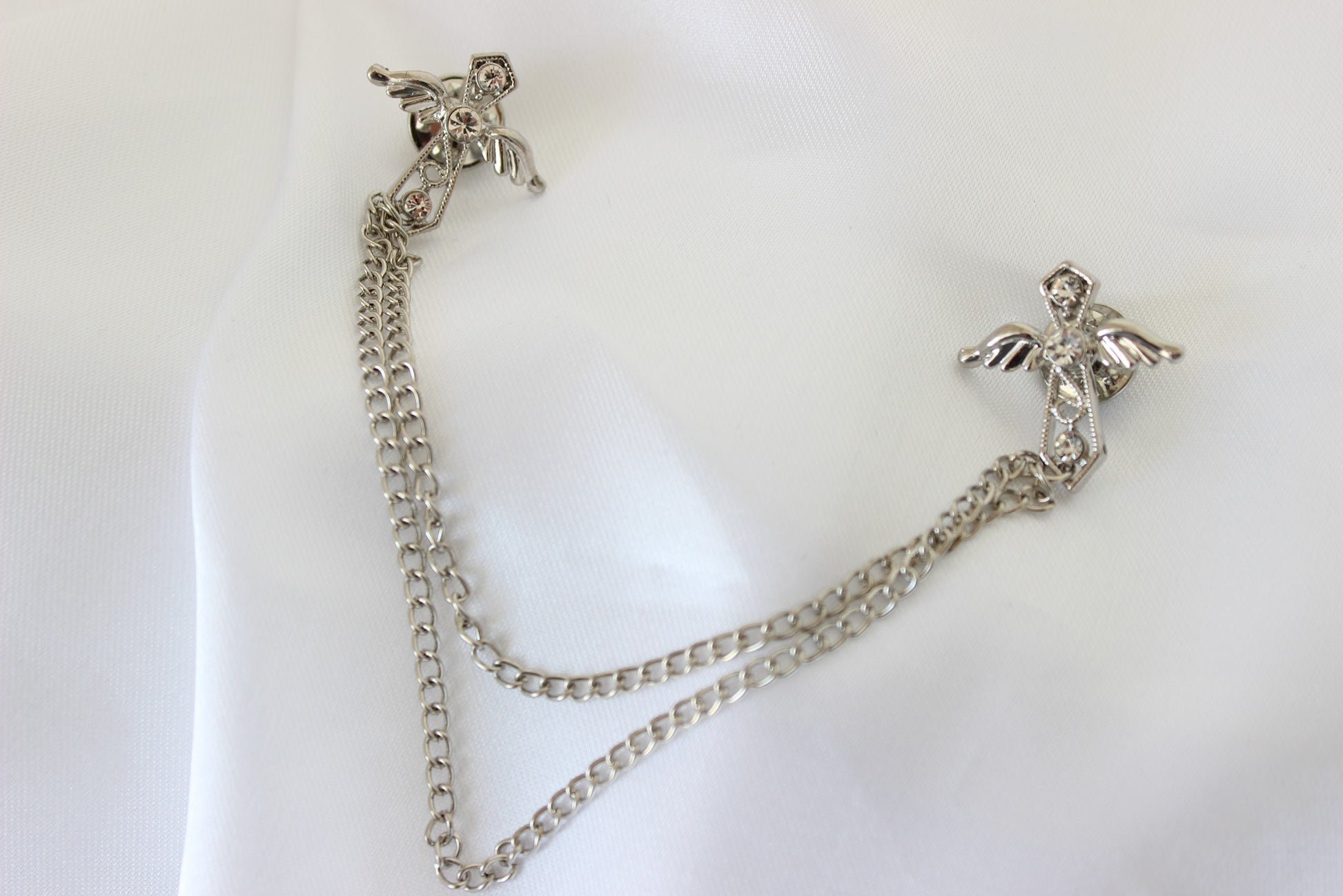 silver angel wing cross brooch