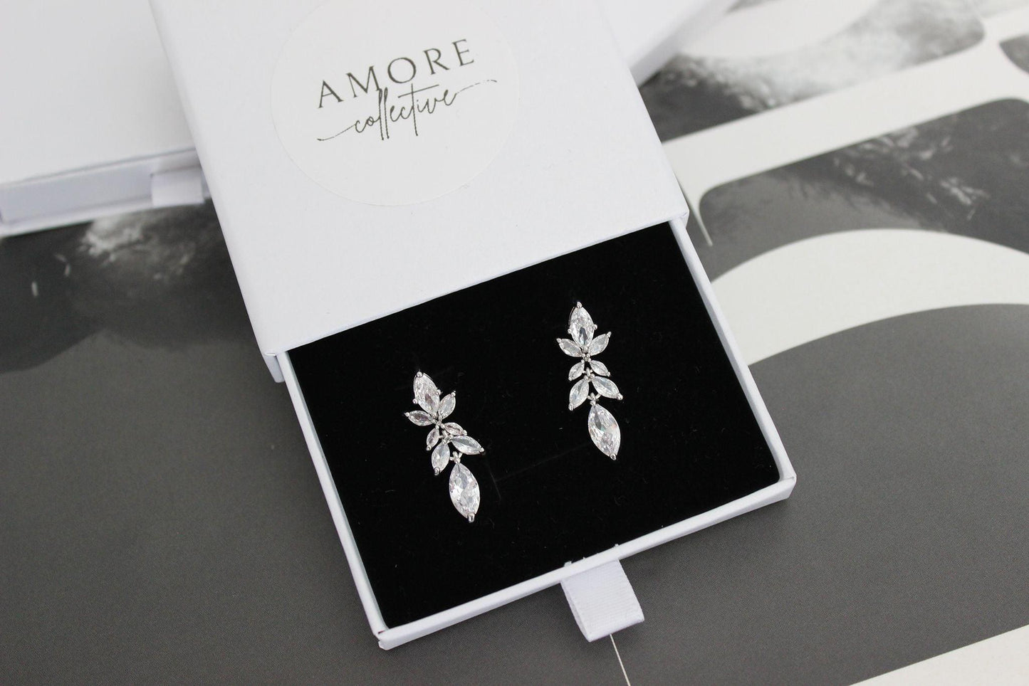 Silver drop bridal earrings with leaf detail