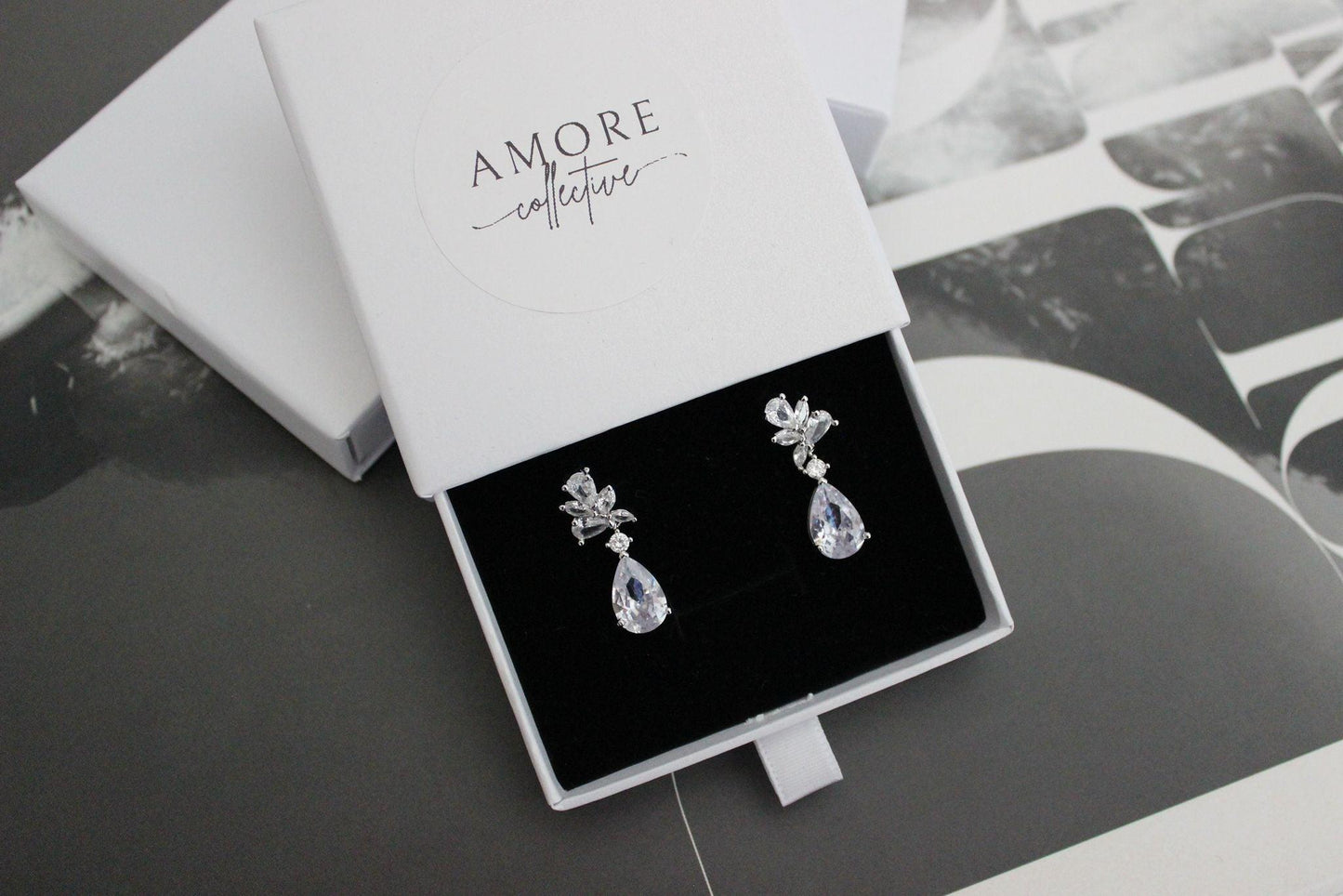 tanesha crystal silver earrings with pear-shaped crystals