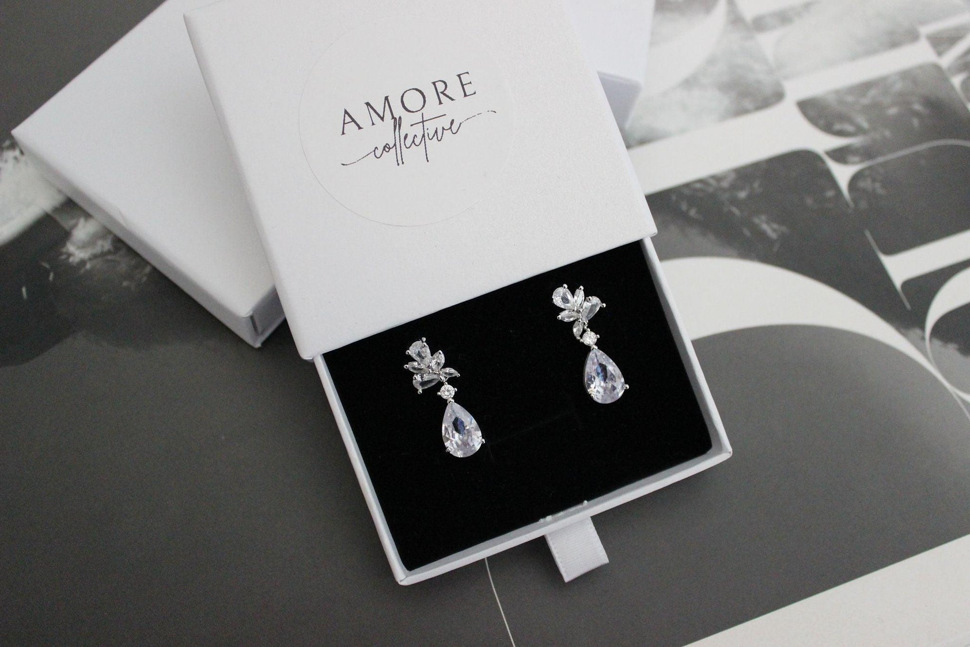 tanesha crystal silver earrings with pear-shaped crystals