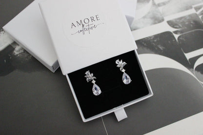 tanesha crystal silver earrings with pear-shaped crystals