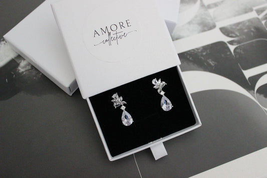 tanesha crystal silver earrings with pear-shaped crystals