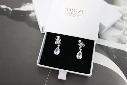 tanesha crystal silver earrings in jewellery box