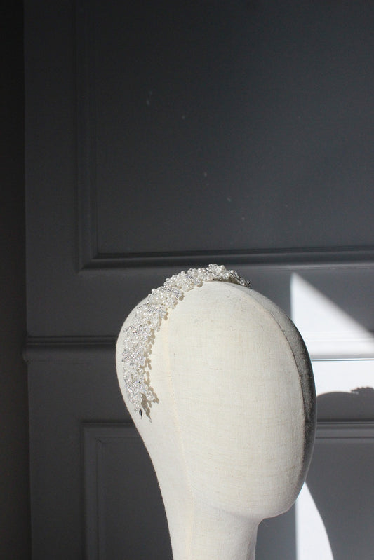 tania bridal headpiece with sparkling crystals on mannequin