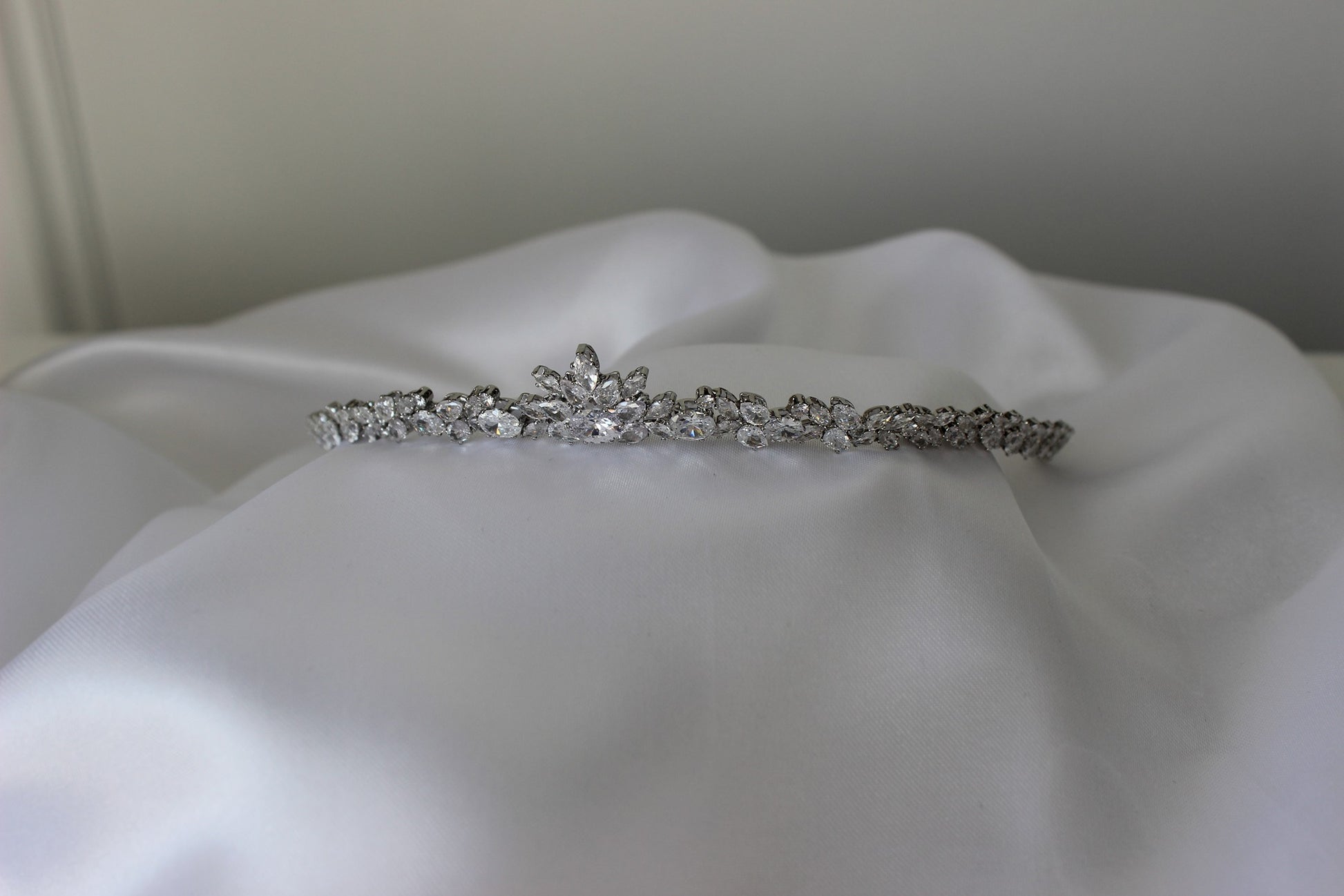 Vivian small silver bridal tiara on white cloth