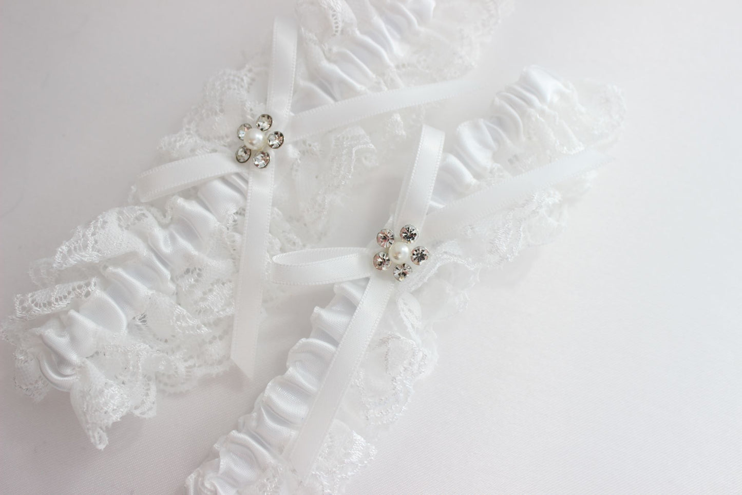White lace bridal garter set
