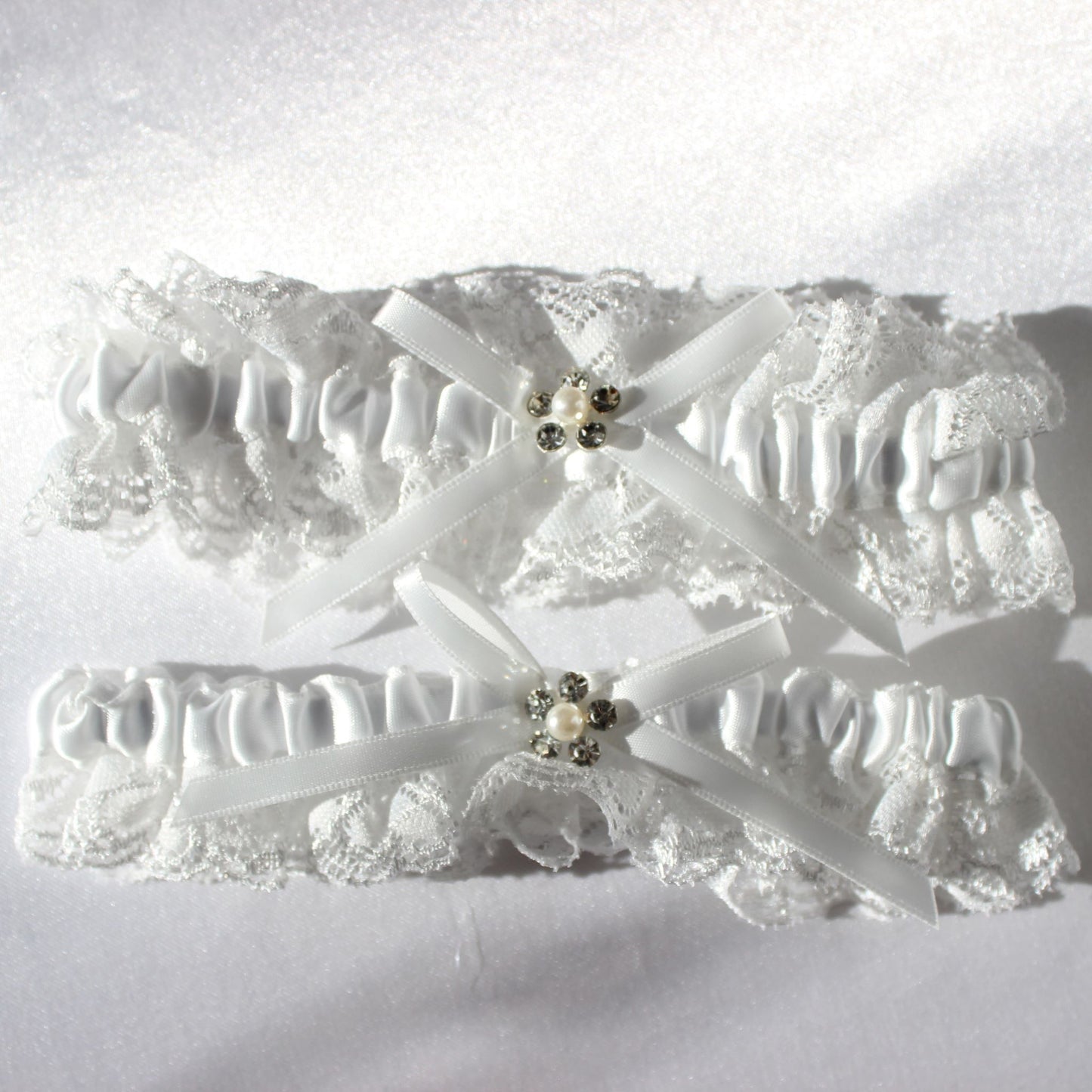 White lace bridal garter set